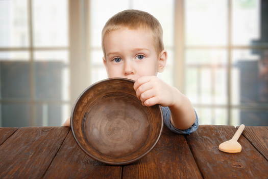 Advocacy groups are pushing political candidates to focus on child poverty. (Milkos/iStockphoto)