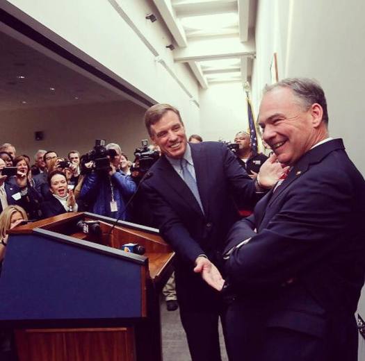 Sen. Mark Warner, D-Va., co-founder of the cyber-crime caucus and seen here shaking the hand of vice presidential nominee Tim Kaine, says the Democratic National Committee hack could have profoundly disturbing implications. (Warner's Office)