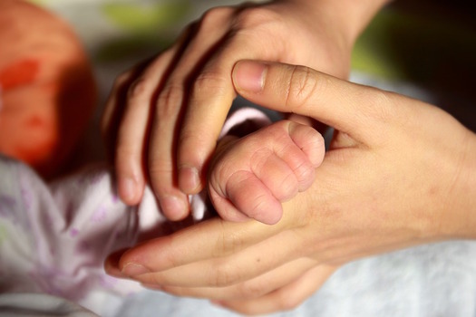 New York's new law will allow up to 12 weeks of paid family leave. (Vitamin/Flickr.com)