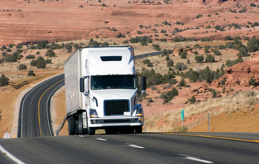 The Obama administration has announced new standards for large trucks and buses, expected to cut emissions by 25 percent over the next decade. (Sadura/iStockphoto) 