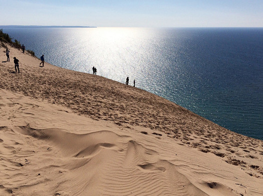 There are more than 3.6 million acres of national land in Michigan, including Sleeping Bear Dunes National Lakeshore. (Ken Bosma/Flickr)