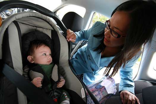 Safety experts recommend that infants and toddlers ride in a rear-facing seat until they are at least two years old. (Raylene Gutierrez/Flickr)