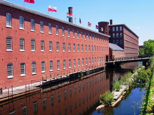 Bay State industries such as this textile plant in Lowell are projected to reap big energy costs savings by 2030 according to new studies on the impact of the Clean Power Plan. (Daderot at English Wikipedia)