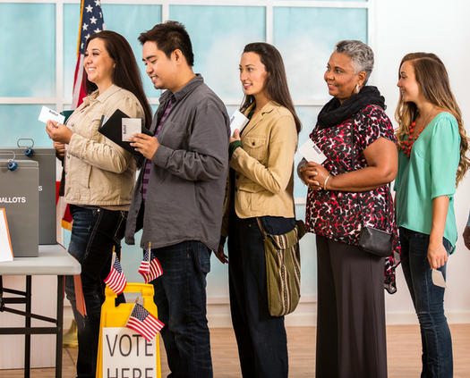 A study finds African-American voters and Latino voters waited, on average, up to twice as long at the polls as white voters in the last election. (PMoore/iStockphoto)