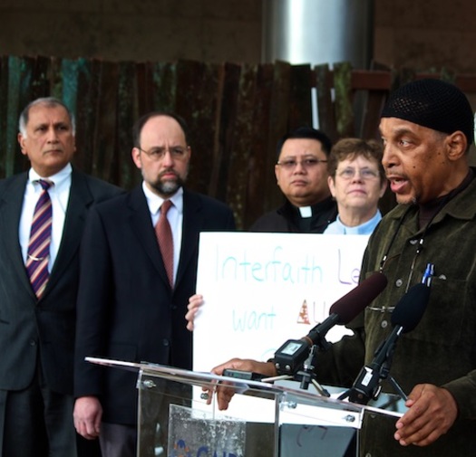 Benjamin Shabazz, speaking at an interfaith conference above, is an imam in Seattle who will be attending Monday night's debates. (CAIR-WA)