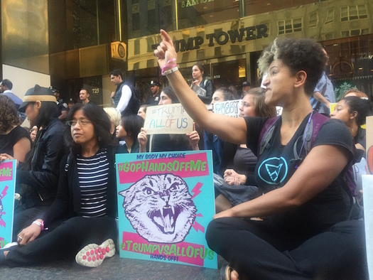 Women formed a human wall outside Trump Tower on Fifth Avenue. Similar protests were held in more than a dozen other U.S. cities. (Brigid Flaherty)