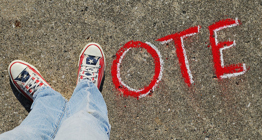 Experts recommend not only talking to kids about the importance of voting, but also encourage them to consider running for office one day. (Theresa Thompson/Flickr)