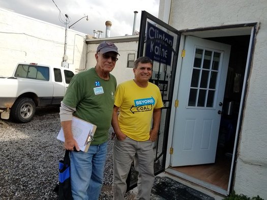 Sierra Club volunteers Tom Gorman and Michael Melendrez canvas the neighborhood encouraging residents to vote. (Susan Martin/Sierra Club Rio Grande Chapter)