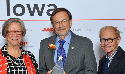 Don Corrigan of Des Moines, center, is the 2016 AARP Iowa Andrus Award Winner. (AARP)