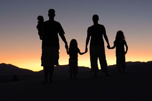 Supporting foster parents can help ensure quality caregiving for children. (Eric Ward/Wikimedia Commons)