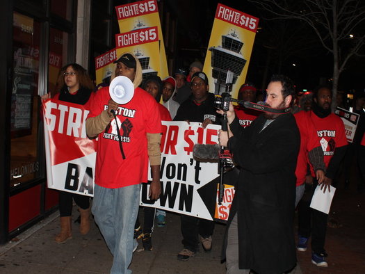 Hundreds of low-wage workers were out before dawn in Boston, marking the fourth anniversary of the 