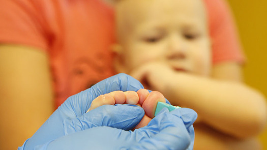 One-year-old Alden Mock is tested for lead exposure at the Pediatric Associates office in Montrose. (Nathaniel Wick for The Colorado Trust)