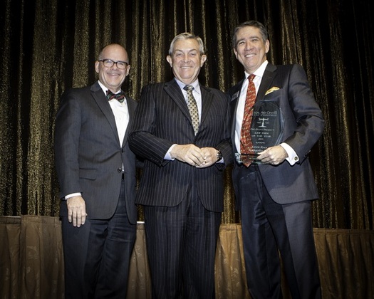 Dan Waite (L) and Dan Polsenberg (R) accept the 2015 Pro Bono Award from Justice James Hardesty for Law Firm of the Year. (Legal Aid Center of Southern Nevada)