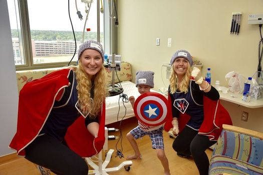 Maryland college students dress as superheroes to entertain sick children. (lym.org)