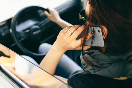 Here's a sight you probably won't be seeing much anymore on California roadways. Handheld phone use while driving is now illegal in the state. (Kaboompics)