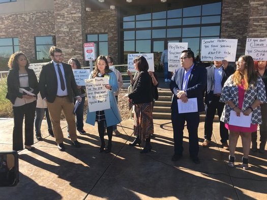 Protesters opposing President-elect Trump's Cabinet picks gathered outside Sen. Dean Heller's office on Tuesday. (Nevada State Education Assn.)