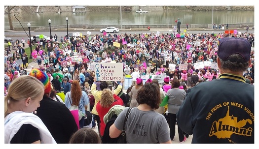 An estimated 3,000 people were at the State Capitol in Charleston on Saturday to voice their support for women's reproductive rights and issues of equality and social justice. (Dan Heyman)
