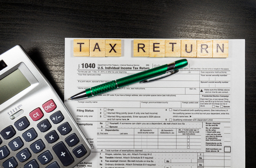 Government agencies and private companies are taking steps to combat tax identity theft. (DaLiu/iStockphoto)