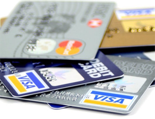 Fees on some payroll debit cards can effectively lower pay below minimum wage. (creative-commons-images.com)