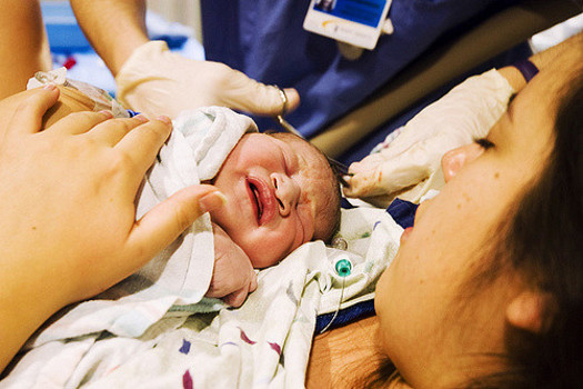 Experts say breastfeeding support in the delivery room is one beneficial step for moms trying to nurse their newborns. (J.K. Califf/Flickr)