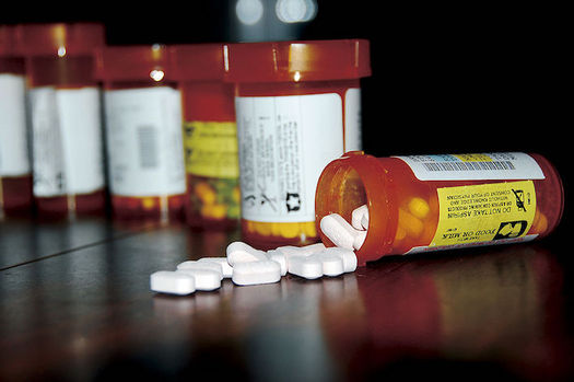 Reining in the cost of prescription drugs is one way to reduce Medicare costs, according to AARP. (USMC/Wikimedia Commons)