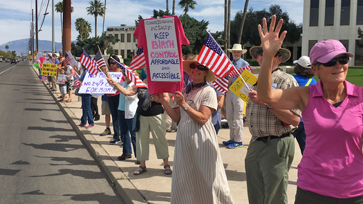 Voters rallied outside Rep. Martha McSally's office, urging the Tucson Democrat to vote against the American Health Care Act. (Dennis Newman)