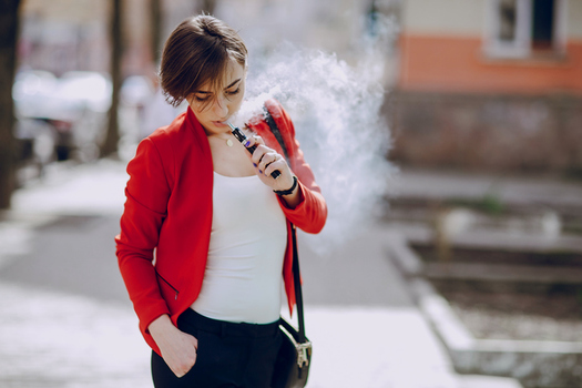 People who use them may think e-cigarettes are harmless, but research says they're not. (prostooleh/iStockphoto)