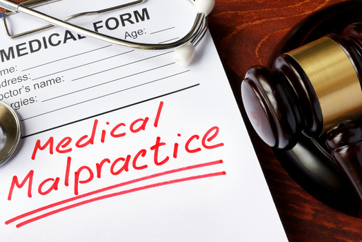 A new poll shows opposition in several primarily Republican states to a bill in Congress that would restrict a patients ability to sue for malpractice. (designer491/iStockphoto)