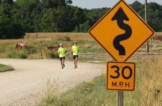 Daren Schumaker and Dennis Lee of Cedar Rapids have spent eight years running marathons in each of Iowa's counties. (Team 99 Counties)