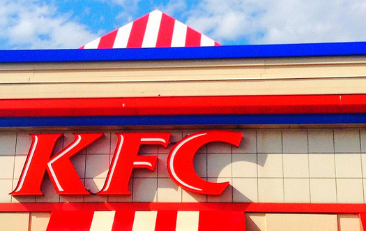 By the end of next year, KFC will be the largest fast food chain to commit to serving chicken that isn't raised using antibiotics. (Mike Mozart/Flickr) 