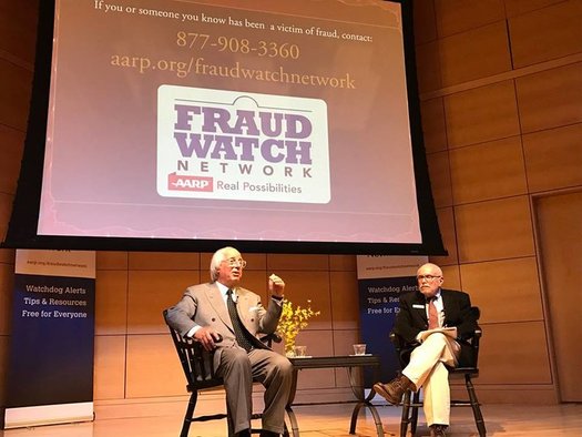 A former identity thief turned fraud expert, Frank Abagnale, Jr. (L) shares tips with Mainers at USM Portland to help them avoid becoming fraud victims. (Carol Brooks)