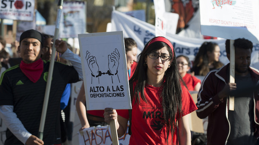 A new report says granting DACA status increases employment rates and workers' wages, and contributes substantially to state tax coffers. (Fibonacci Blue/Flickr)