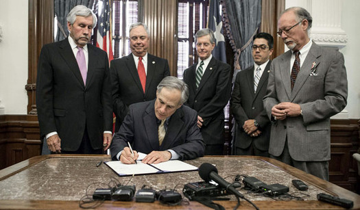 Texas Gov. Greg Abbott signs one of dozens of bills passed by the Texas Legislature this session. Opponents already have begun filing legal challenges to many of them. (TexasGovermentOnline)