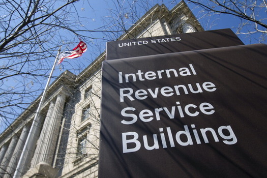 If you get a call from someone identifying themselves as an IRS agent and demanding immediate payment, a Wisconsin consumer expert says hang up, because it's a scam. (Bloomberg/Getty Images)