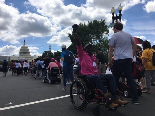 Bay Staters with disabilities are on the front lines this week in battles to preserve critical health coverage both in Massachusetts and Congress. (Boston Center for Independent Living)