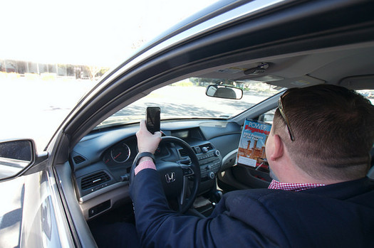 It's illegal in Washington state to use a cellphone while driving. (mliu92/Flickr)