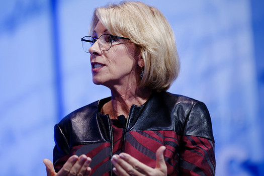 U.S. Education Secretary Betsy DeVos backs a Trump administration budget proposal that would cut total federal spending on public schools by $9 billion. (Michael Vadon/Flickr)