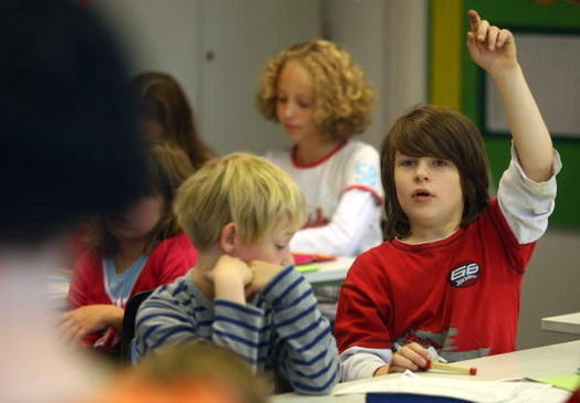 A new report says that students who miss more than 18 days of school are considered chronically absent and at risk for reading below their grade level. (Gallup/GettyImages)