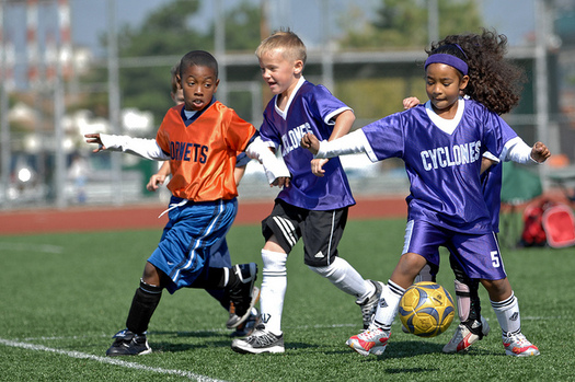 Health experts say kids should be involved in activities such as soccer to fight the growing epidemic of childhood obesity. (Edward N. Johnson/Flickr)