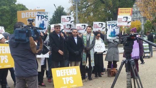 Protestors defend the TPS program at a rally in front of the White House on Tuesday. (Sarah Hall/Carecen)