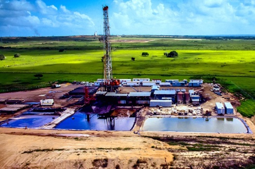 Ponds near oil rigs store wastewater from the fracking process, which is disposed of by injecting it back into the well. Some scientists believe this can cause earthquakes. (GettyImages)
