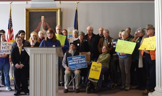Melissa Hinebauch speaks in Concord on Thursday about her experiences protesting the tax-law changes making their way through Congress. (Granite State Progress)