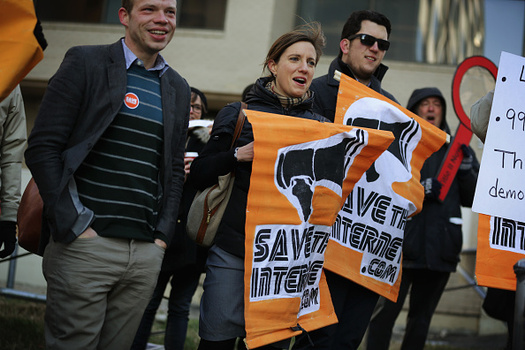 Protestors across the country will gather outside of Verizon stories on Thursday to oppose the rollback of net neutrality. (Alex Wong/Getty Images)
