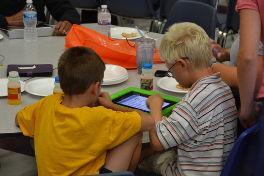 Kids spend an average of nine hours a day in front of a digital or media device. (Kevin Jarrett/Flickr)