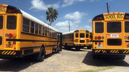 The state of Texas is warning school districts that busing students to polling places could constitute 