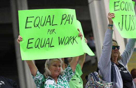 Women make 76 cents for every dollar a man makes in Idaho. (Joe Raedle/Getty Images)