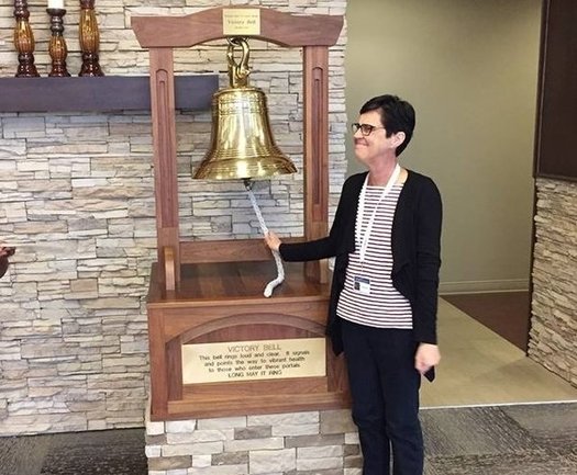 Elizabeth Clarke of Unicoi County rings the victory bell at the Provision CARES Proton Therapy Center  a traditional rite of passage when patients complete their treatment. (Elizabeth Clarke)