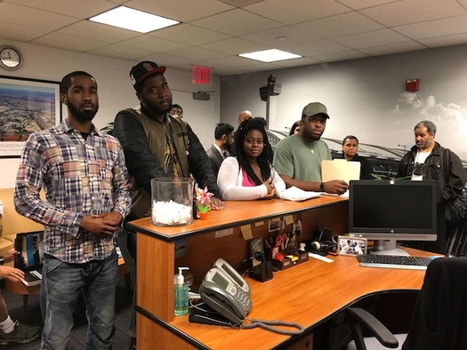 A delegation of workers delivers letters outlining their complaints to JFK International Air Terminal, which operates Terminal 4. (32BJ SEIU)