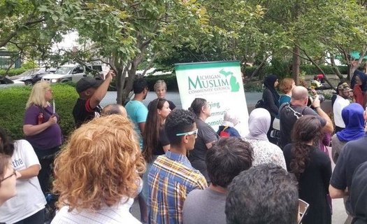 Opponents of the U.S. Supreme Court travel ban decision call on Congress to step in at a rally in Detroit on Tuesday evening. (Michigan Muslim Community Council)