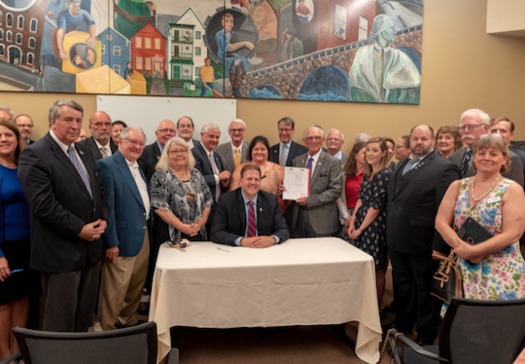 Gov. Chris Sununu signed the Medicaid expansion bill just last week, and it already faces new hurdles. (Office of Gov. Sununu)